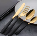 Four-piece stainless steel cutlery set in black with mirror polished finish