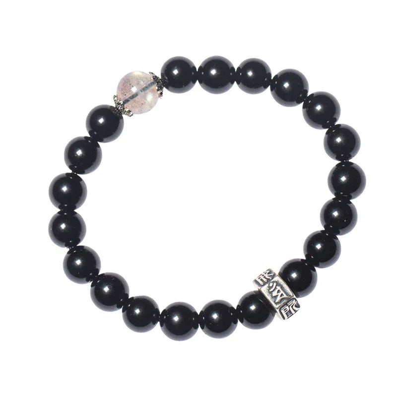 Obsidian bracelet with 8mm beads carved with zodiac animals and bodhisattva figures.