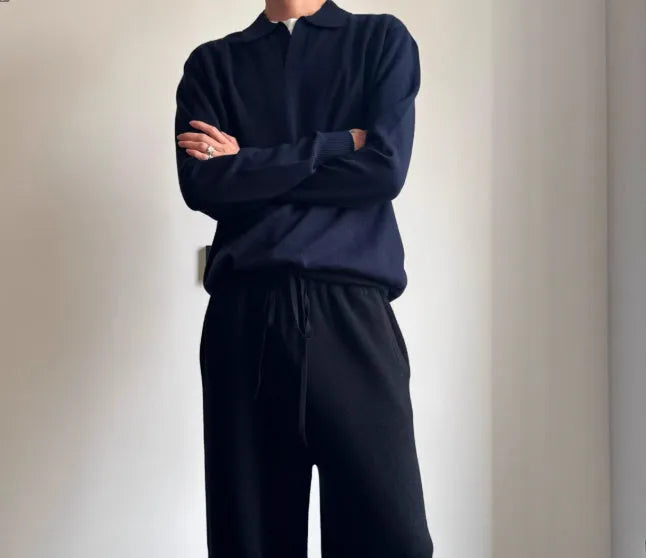 Pure wool lapel-collar polo sweater in a loose fit, shown in milky white.