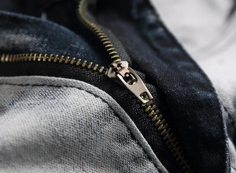 Men's blue and white faded cotton denim jeans with distressed worn finish, straight leg style