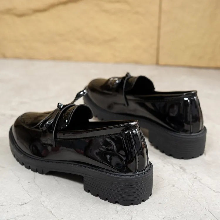 Women's black loafers with decorative bow detail for spring and autumn seasons