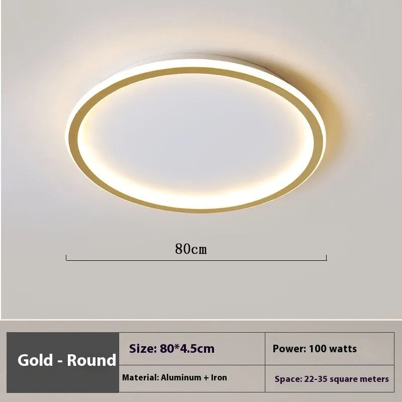 Minimalist round ceiling lamp in black finish with dimmable LED lighting for a bedroom.
