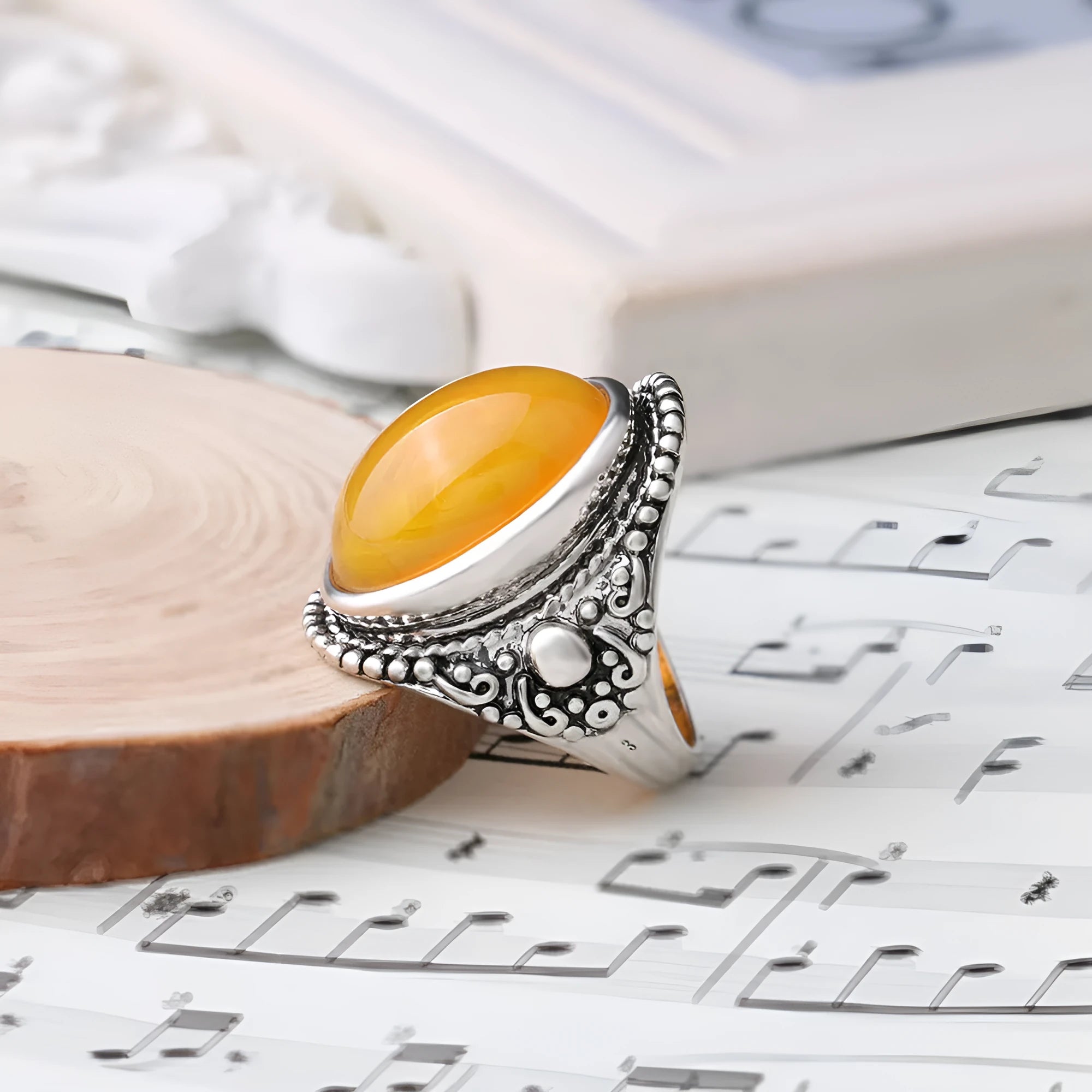 Geometric retro ring in antique silver amber colour with alloy electroplated construction
