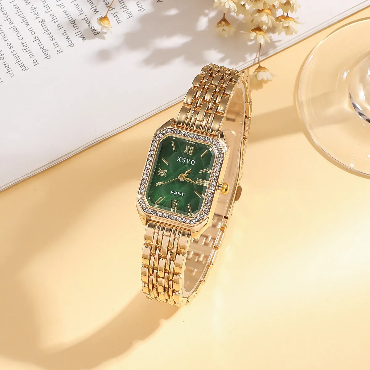 Gold green square dial women's watch with four matching alloy bracelets featuring jewellery buckle closures