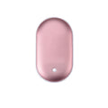 Compact rose gold rechargeable hand warmer and USB power bank with digital display.