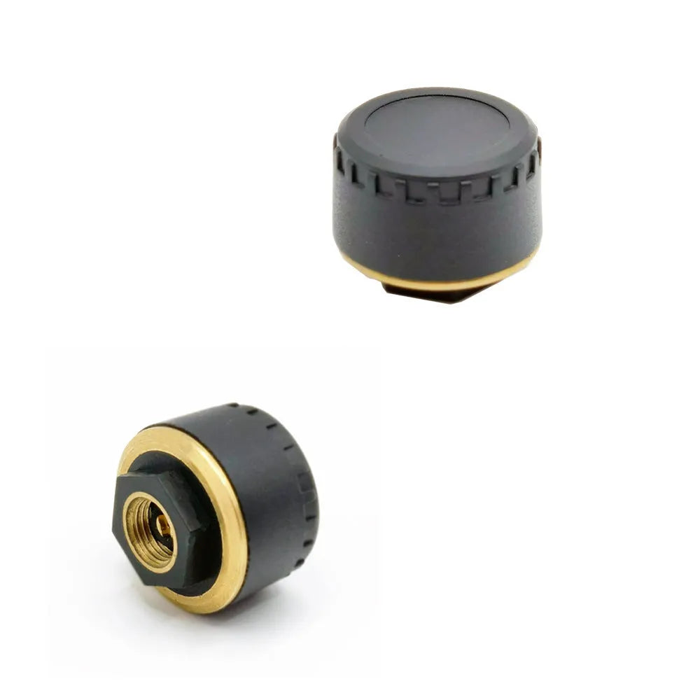 Four black Bluetooth tyre pressure monitors for smartphone connection with IP67 waterproof rating