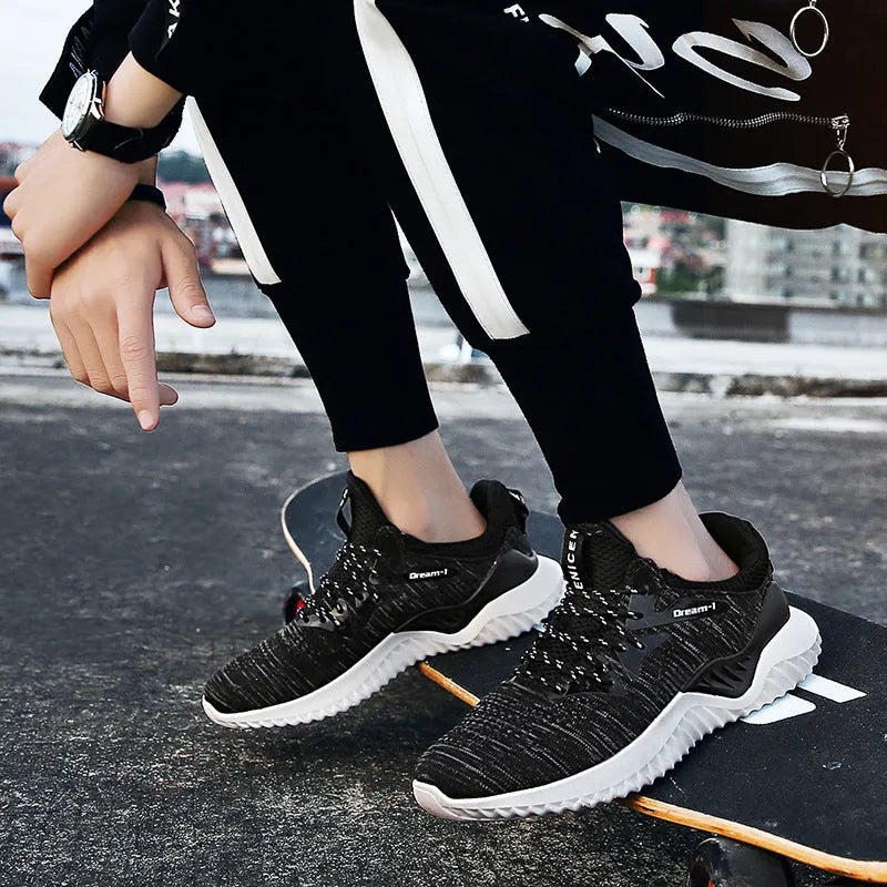 Adult low-top running shoes with front strap closure and mesh upper in various colour options