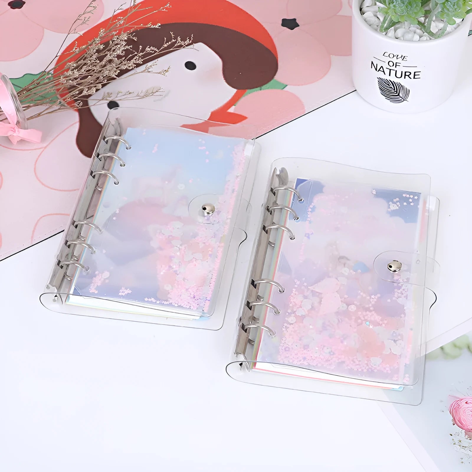 Metal binder shell notebook with PVC cover in Alice Castle design, showing loose leaf Daolin paper and pull side bag.