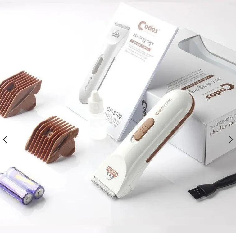 White cordless electric pet hair clipper with ceramic blade for dog and cat grooming.