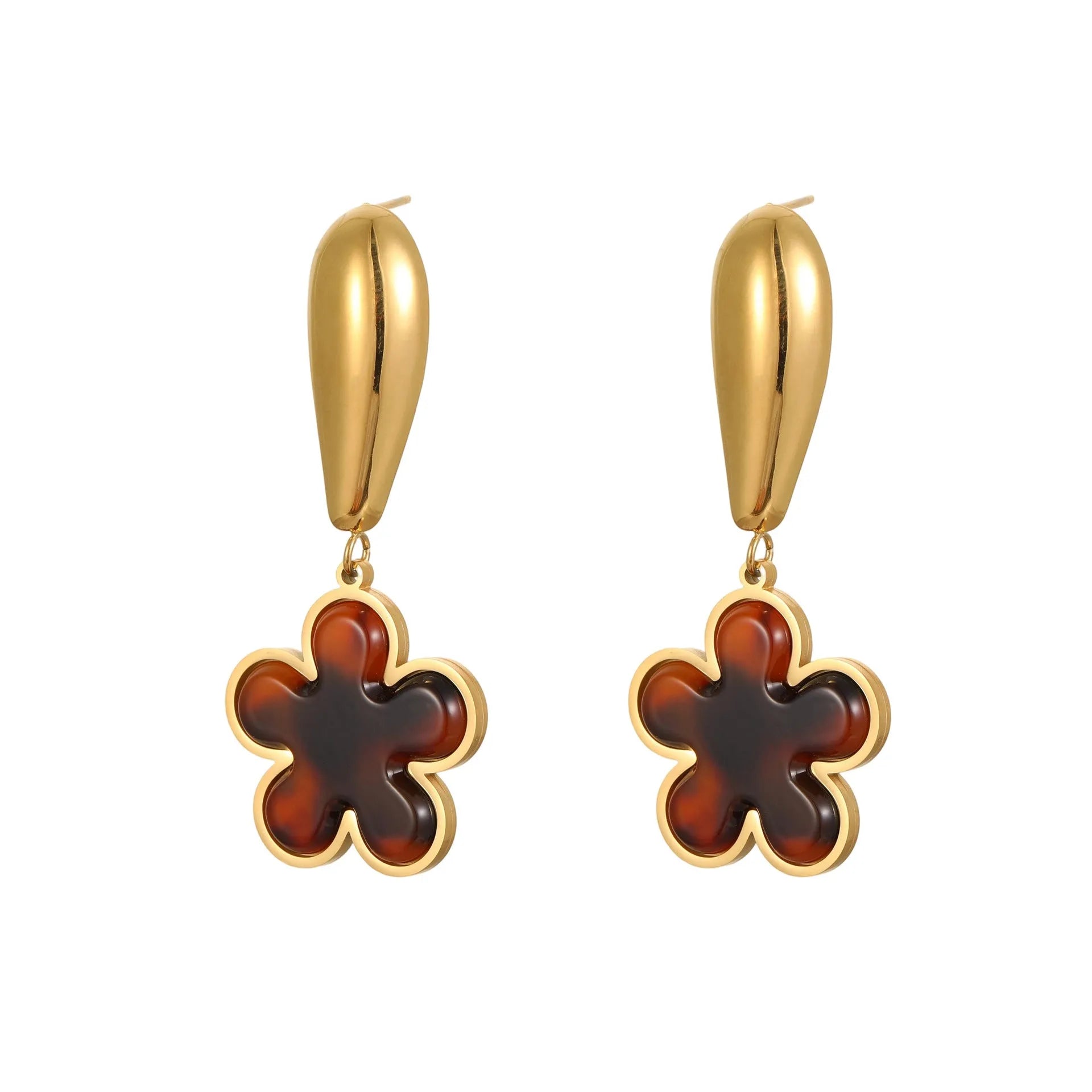 Close up of 18K gold plated stainless steel earrings featuring tortoiseshell resin in heart and flower geometric shapes for women.