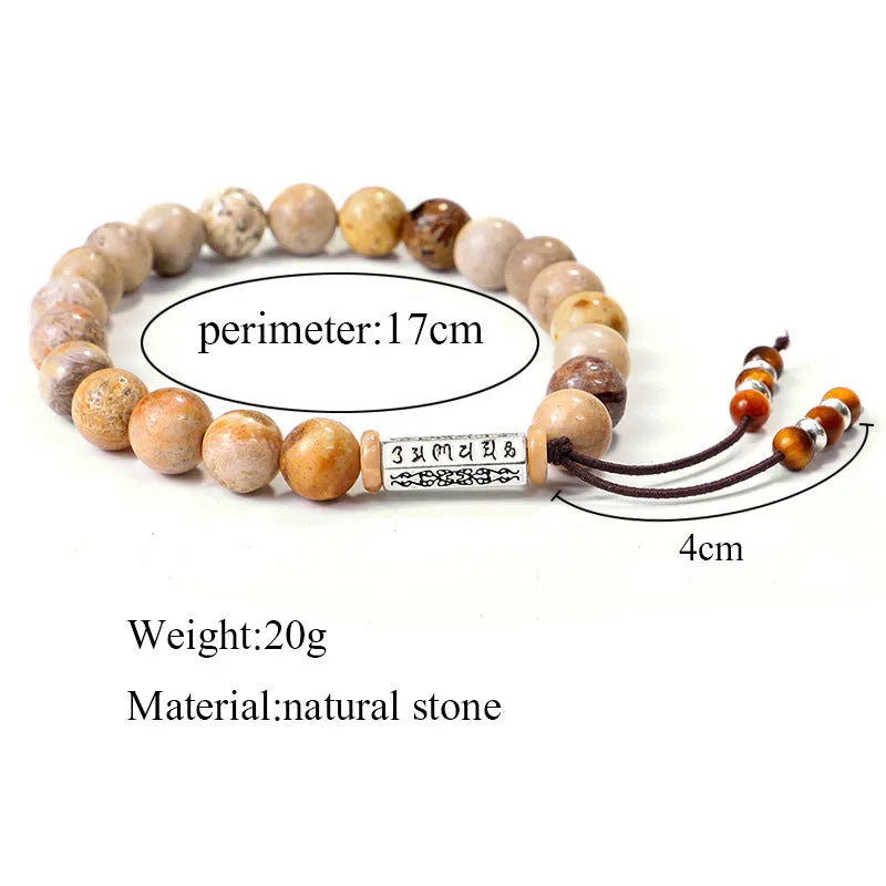 Original design handmade stone bead bracelet in natural wood colour on wrist.