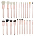 26 pink makeup brushes with wooden handles arranged in a PU carry case.