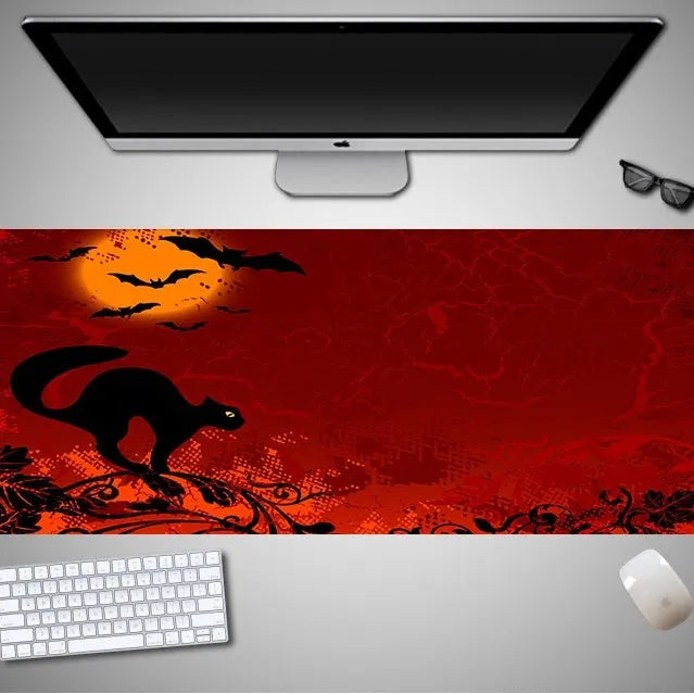Halloween-themed oversized mouse pad showing rubber cloth texture and non-slip base