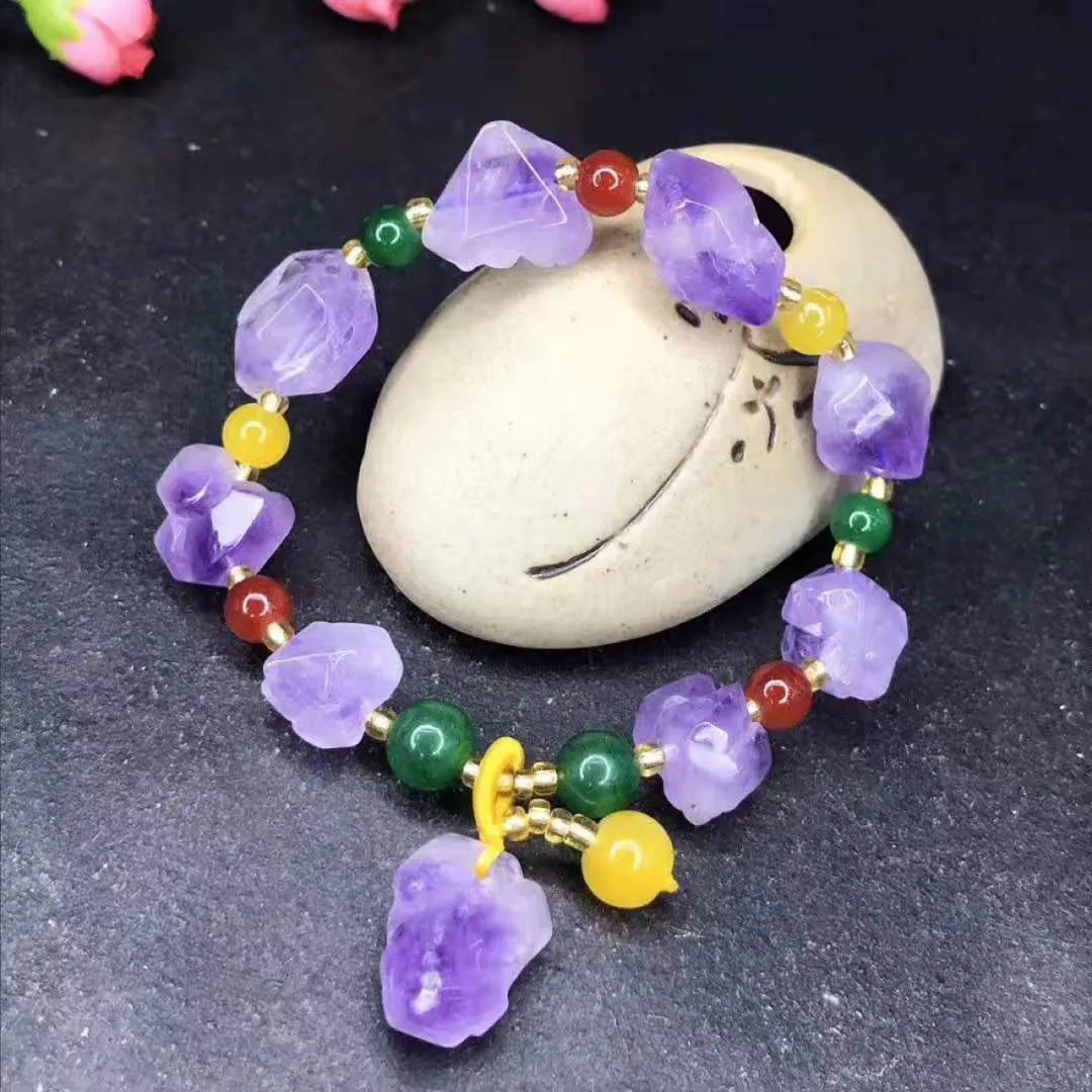Natural purple amethyst bead bracelet for women with a silver Fu character charm.