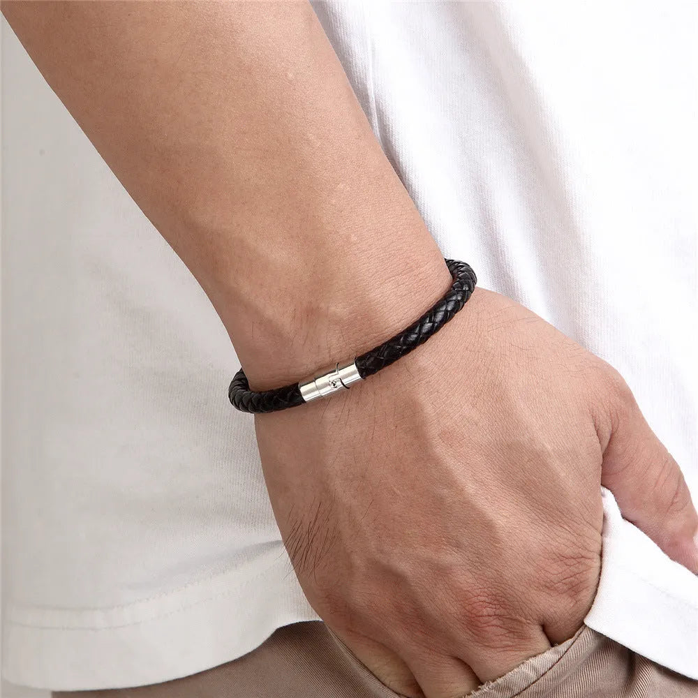 Titanium steel geometric wire bracelet with magnet socket closure showing linear design elements