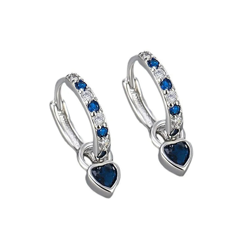 Heart-shaped ladies fashion earrings with coloured stone centrepiece and gold colour plating