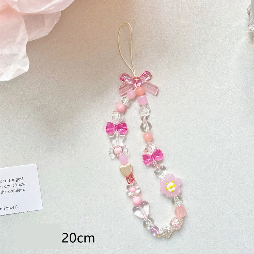 Beaded flower phone lanyard with plastic resin beads on adjustable cord in yellow, blue or pink
