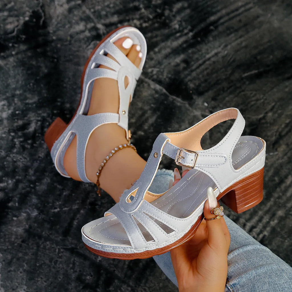 Women's black PU peep toe wedge sandals with an adjustable buckle strap.