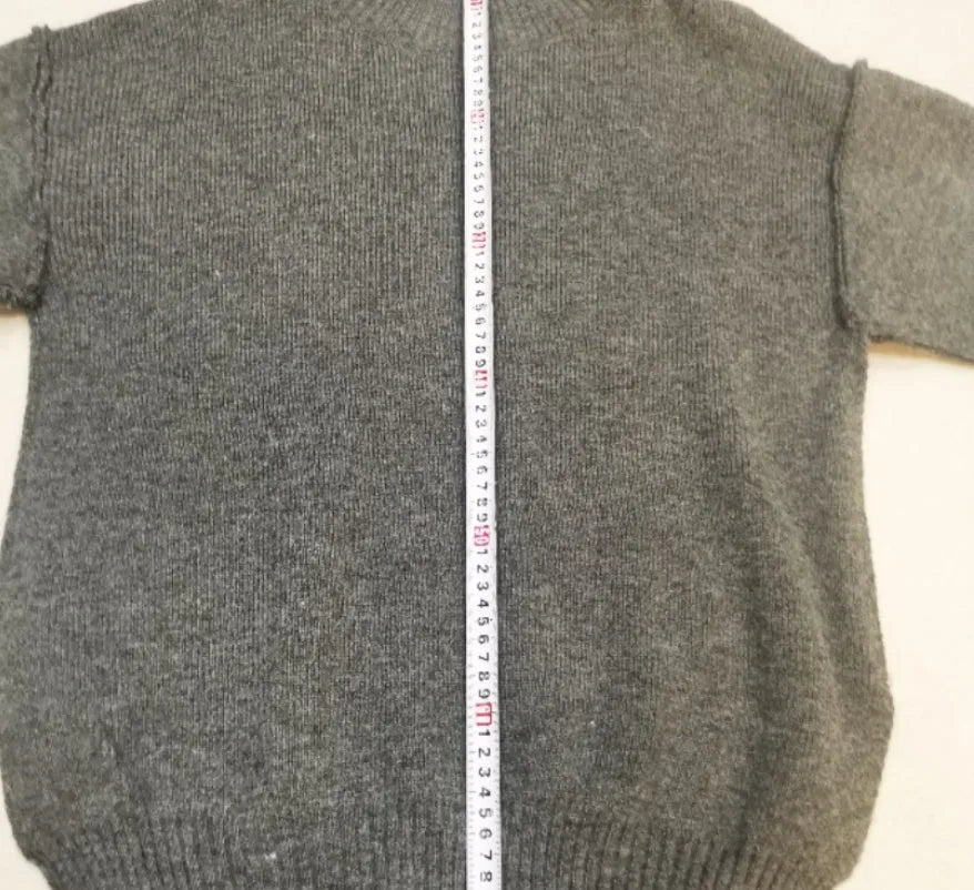 Ladies' side-slit sweater and trousers suit in a solid colour