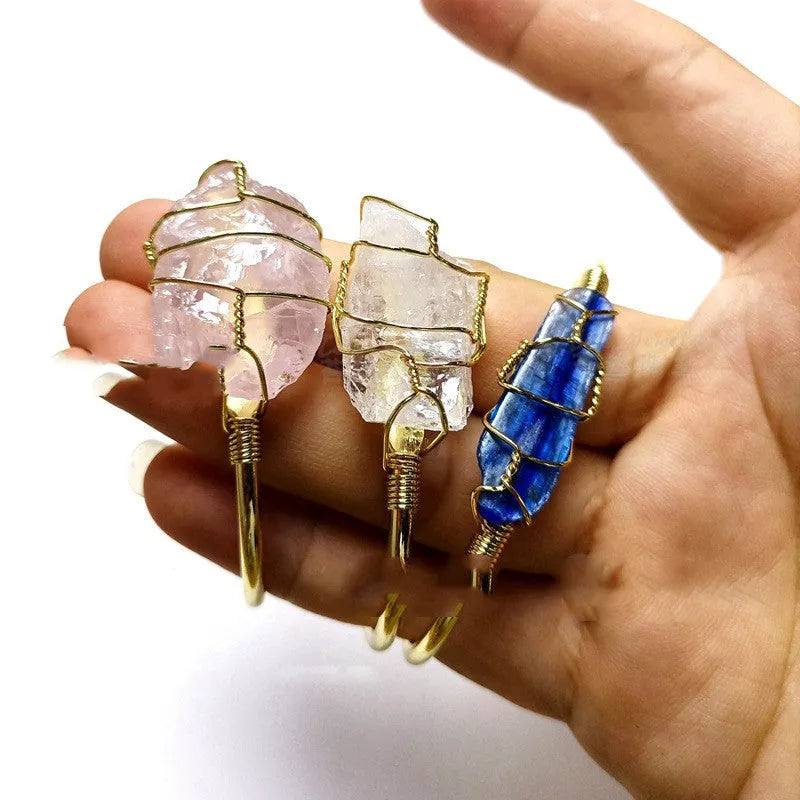 Natural crystal rough stone bracelet with gold metal winding in a geometric bohemian design