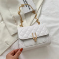 Women's diamond lattice chain crossbody bag in solid colour with adjustable shoulder strap