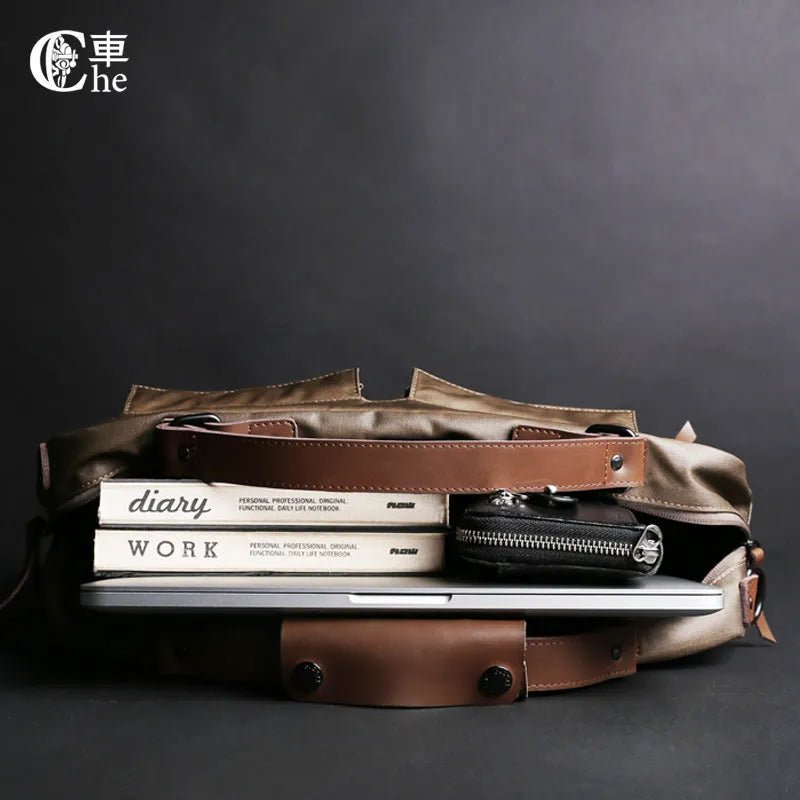 Dpark single shoulder sling laptop bag in black, open showing padded interior for a 15-inch laptop.
