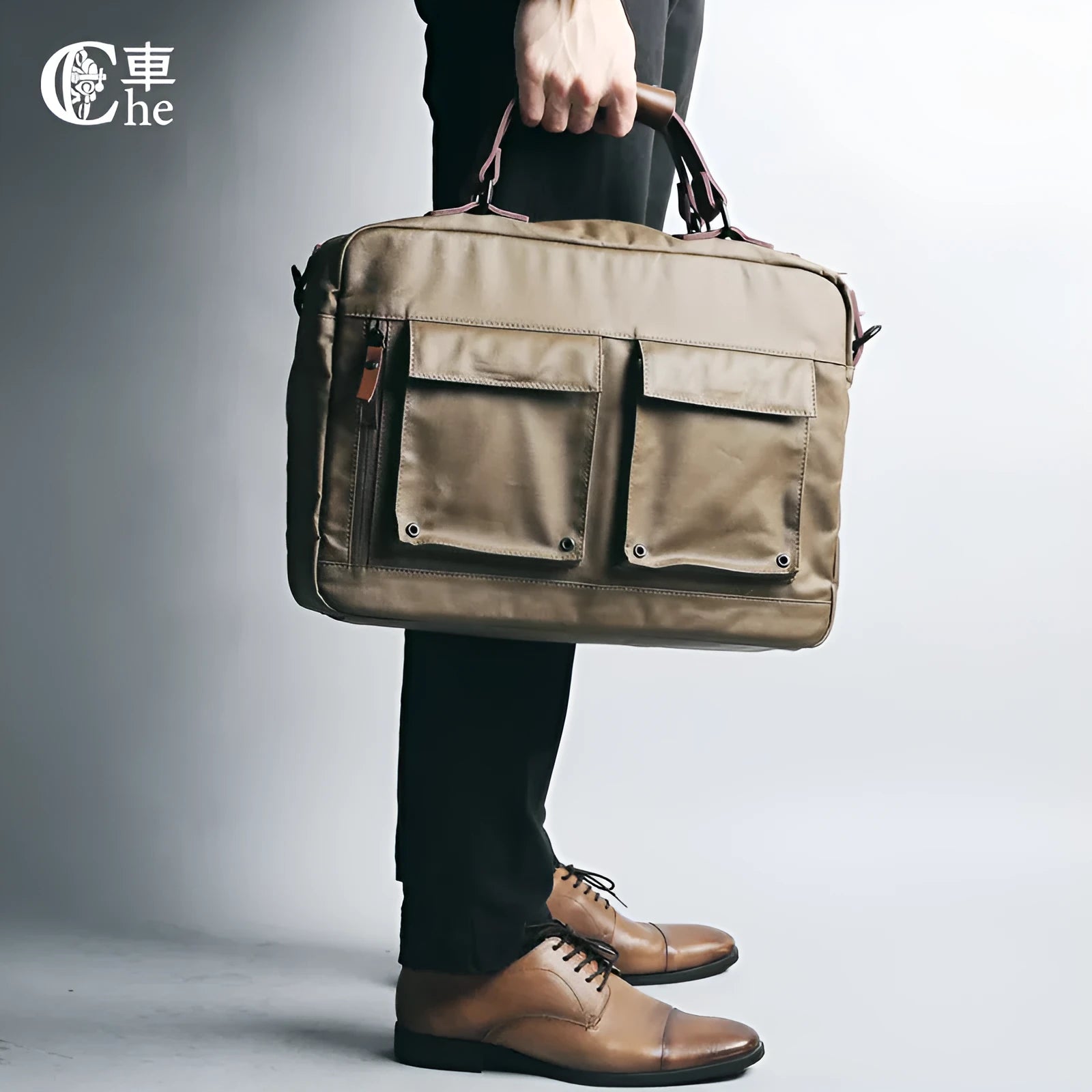 Dpark single shoulder sling laptop bag in black, open showing padded interior for a 15-inch laptop.
