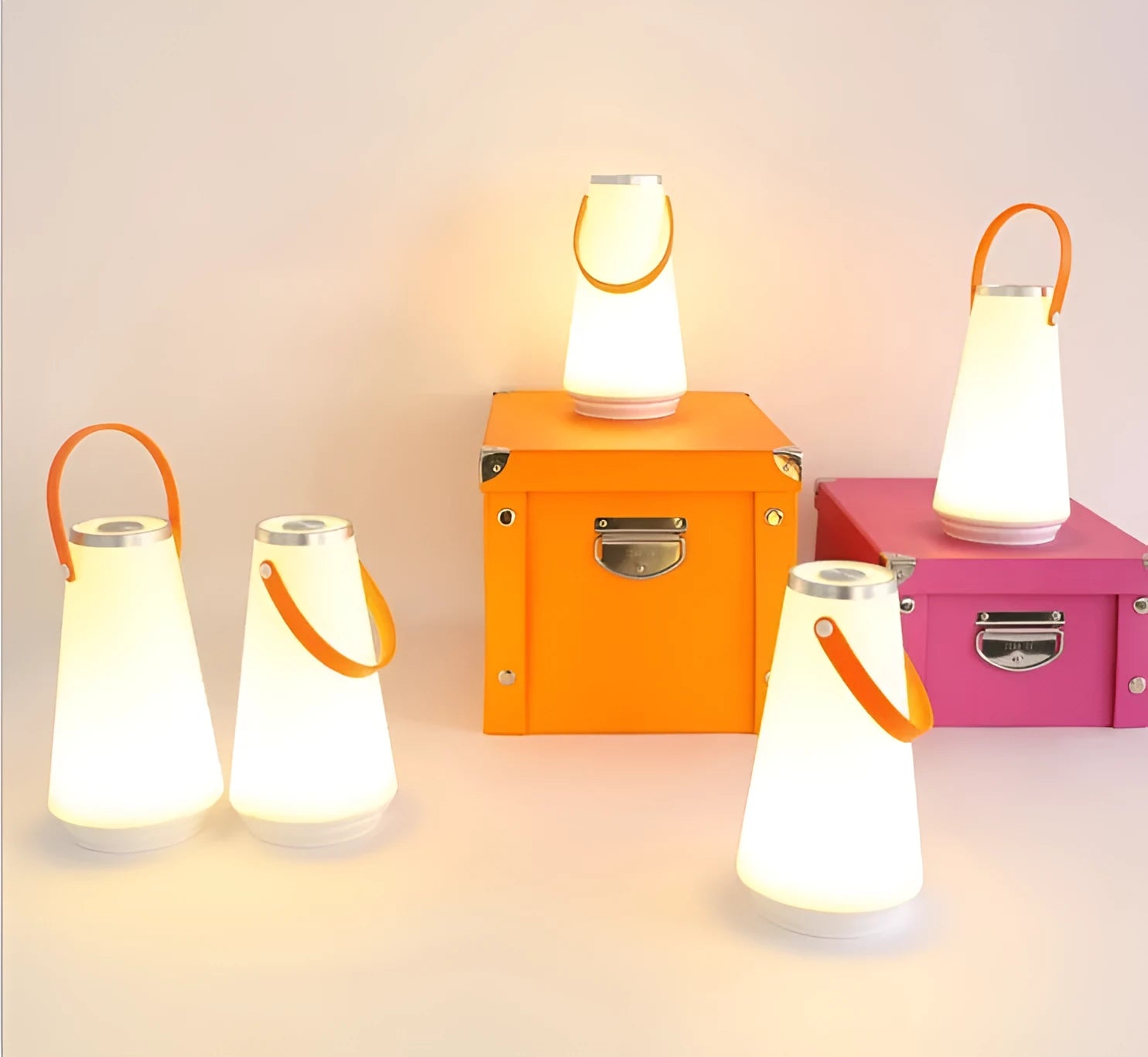 White rechargeable LED bedside lamp with adjustable brightness on a table.