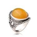 Geometric retro ring in antique silver amber colour with alloy electroplated construction