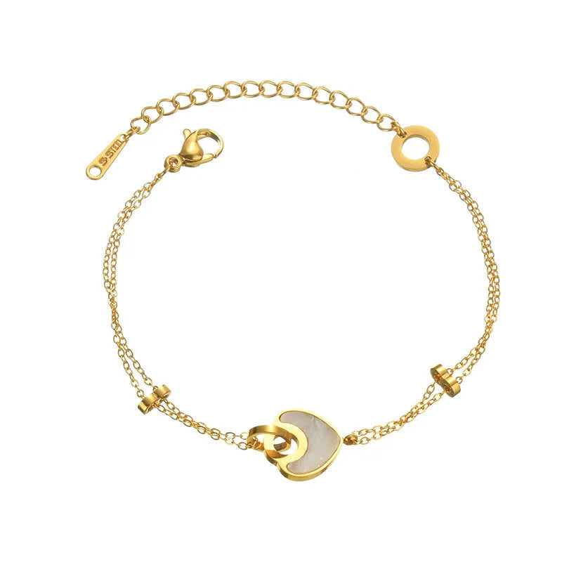 Stainless steel and resin heart-shaped bracelet for women with double layer design.