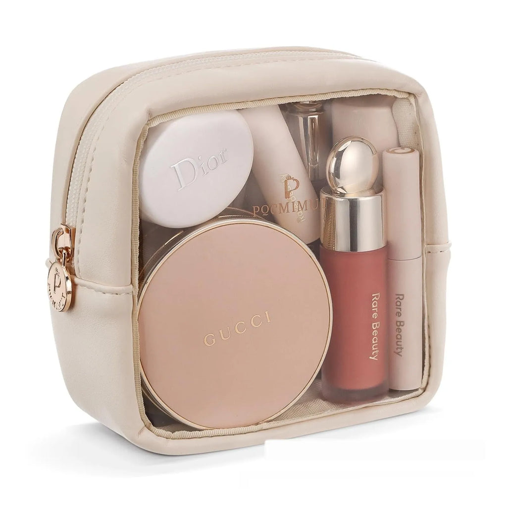 Transparent PVC cosmetic bag with waterproof design and polyester lining available in pink, beige, and brown.