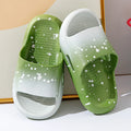 Gradient coloured PVC slipper sandals for children on a white background.