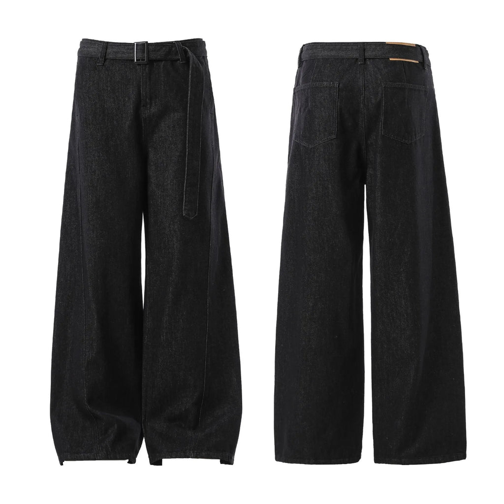 Black high waisted straight leg jeans with gold accents and zip fly opening