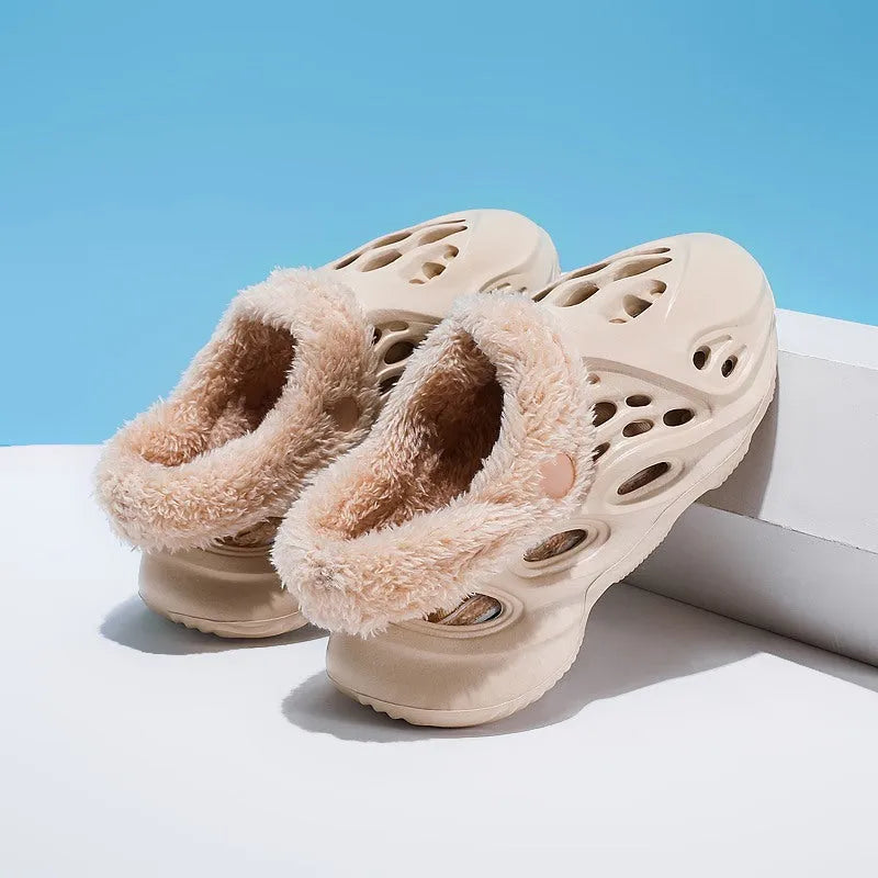 Unisex EVA hole slip slippers in apricot with removable warm plush cover on a light background