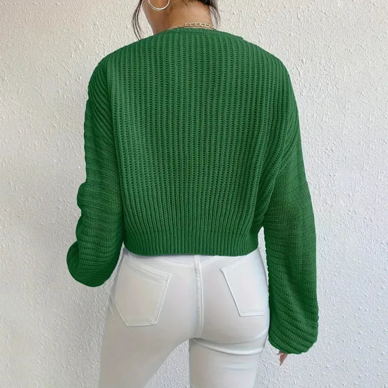Women's solid colour long sleeve pullover top in a loose casual fit.