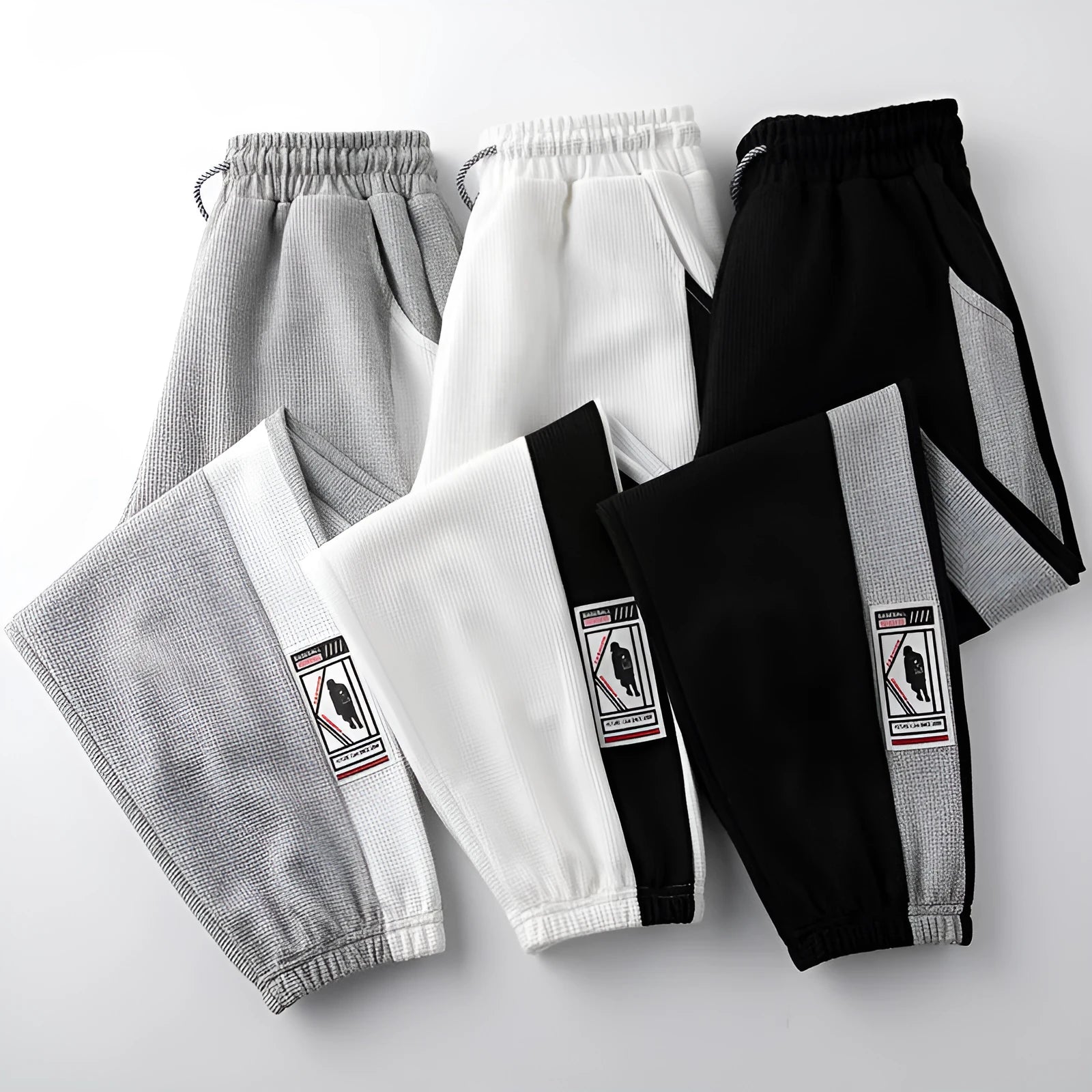 Men's casual wide leg fleece lined trousers in black, loose fit with drawstring waist