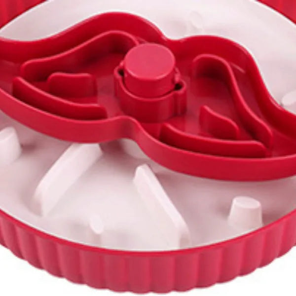 Pet slow feeder bowl with rotating game board design and silicone feeding pads in windmill pattern
