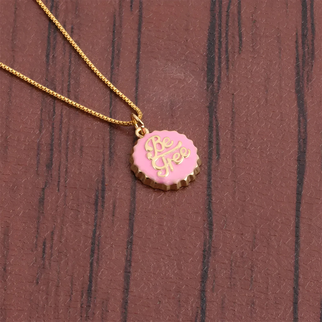 Copper bottle cap pendant necklace on a 40cm box chain with 18K gold electroplating, shown in one of six available colours.