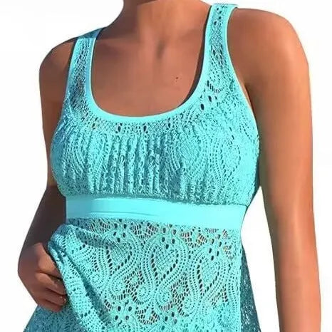 Women's conservative hollow-out two-piece swimwear set in nylon, showing sleeveless top and briefs.