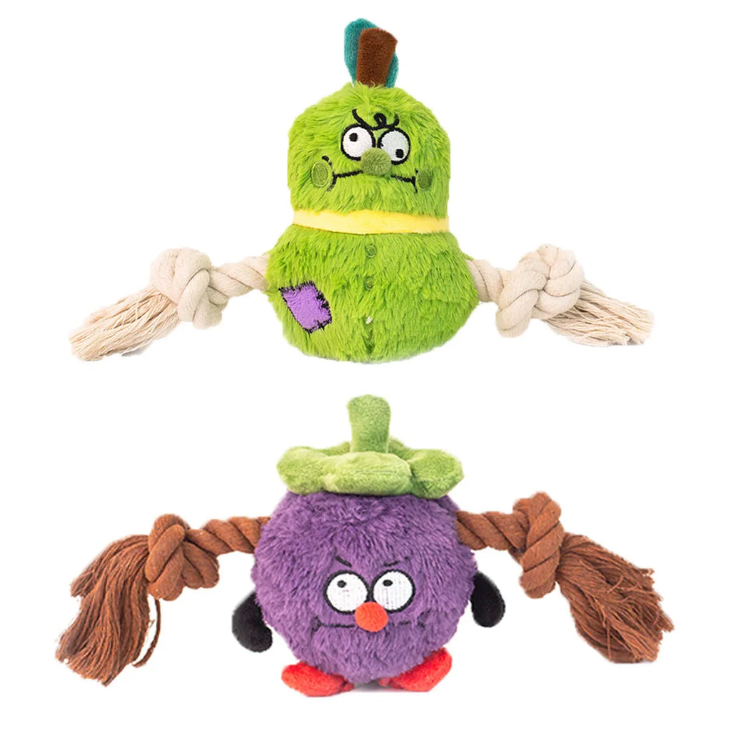 Green and purple interactive dog toy showing a plush rope knot and a molar tooth design for tugging and chewing.