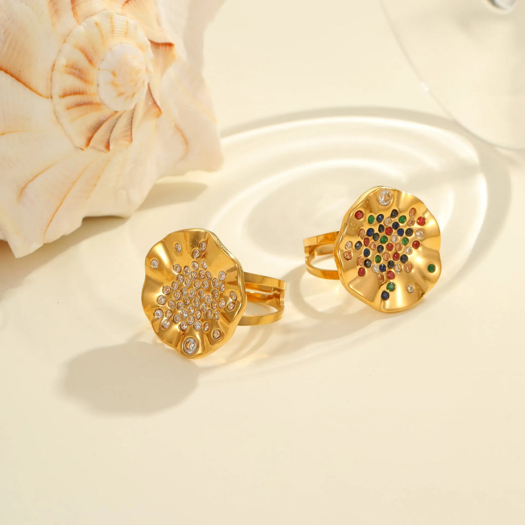 Geometric open mouth ring with pleated detailing and colourful crystal inlay on stainless steel
