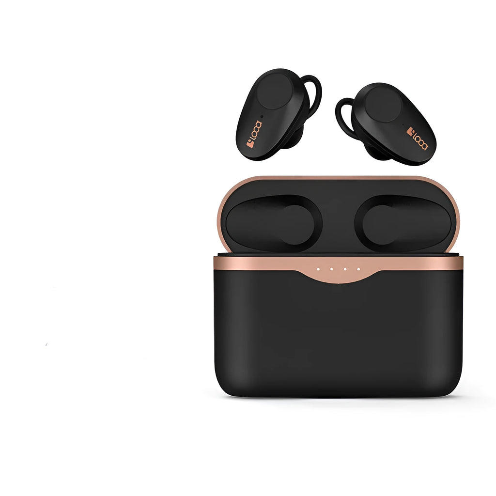 Black wireless Bluetooth headphones with charging stand on a table