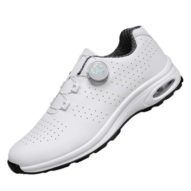 Black and white low top mesh casual shoes with cross shoulder straps and lace-up front.