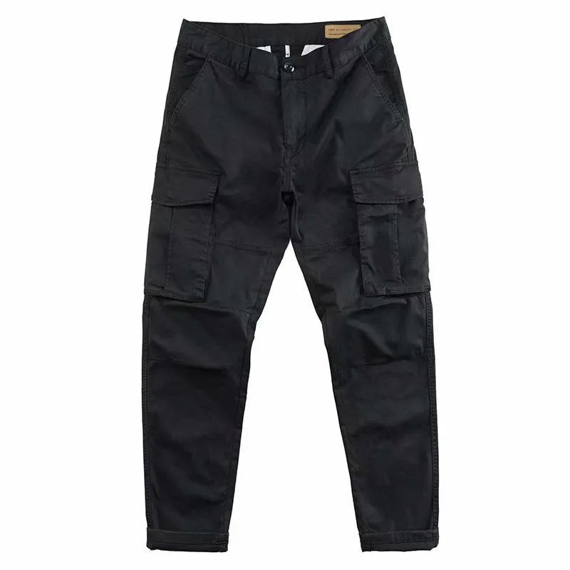 Men's multi-pocket cotton work trousers in cropped length showing cargo pocket design