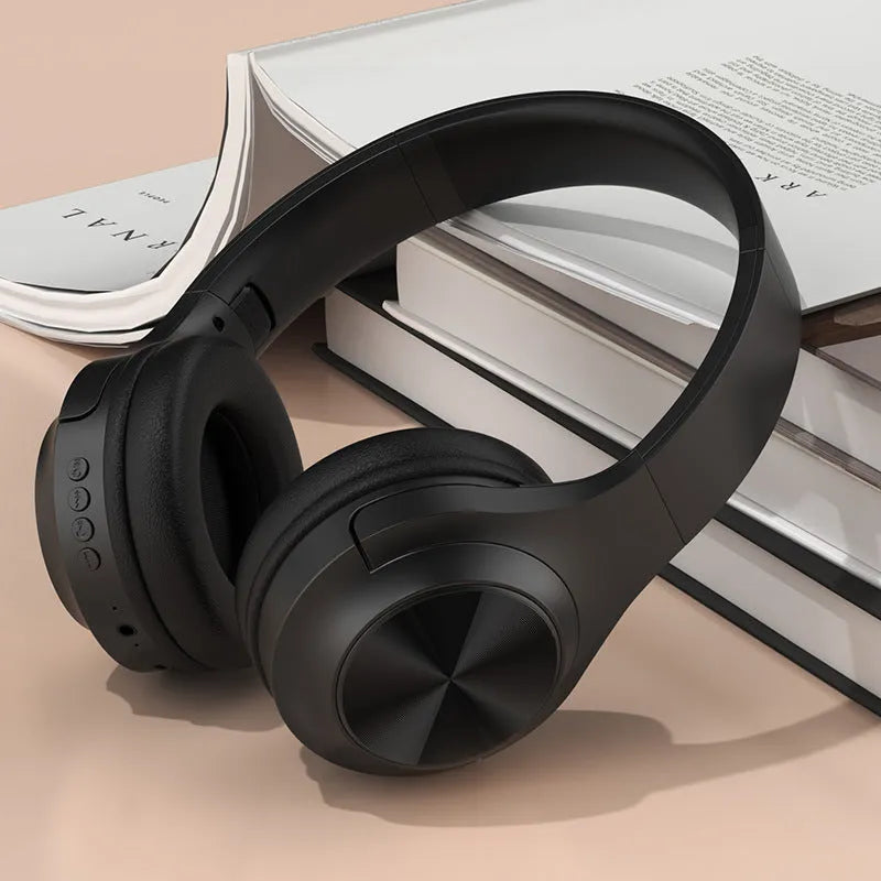 Personalized wireless Bluetooth headset with head-mounted design in ivory white, chalk black, and youth green colour options