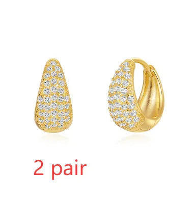 Gold electroplated brass diamond earclip earrings with geometric round design on copper base