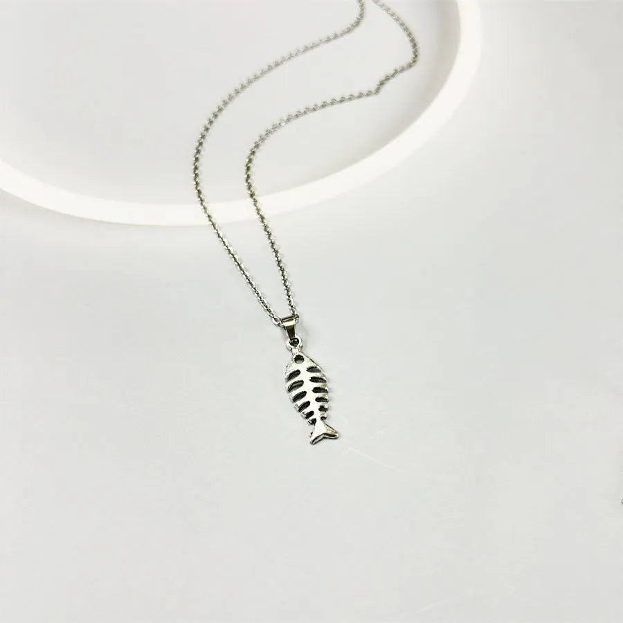 Female Creativity retro alloy jewellery set with fishbone pendant necklace and matching earrings on adjustable O-chain.