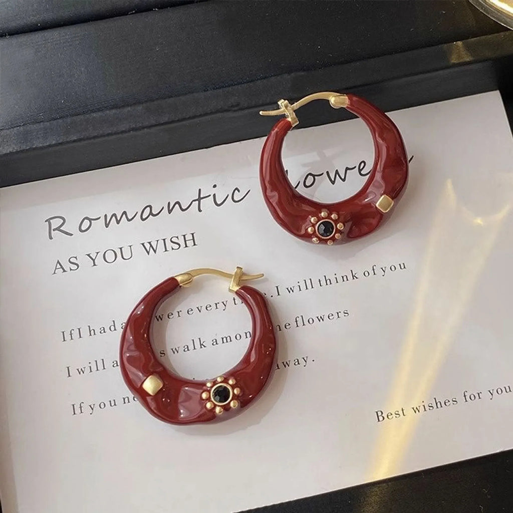 Hong Kong style retro ear studs with rhinestone detailing in black and red colour options