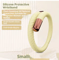 Silicone mosquito repellent liquid protective bracelet in light yellow colour on a white background