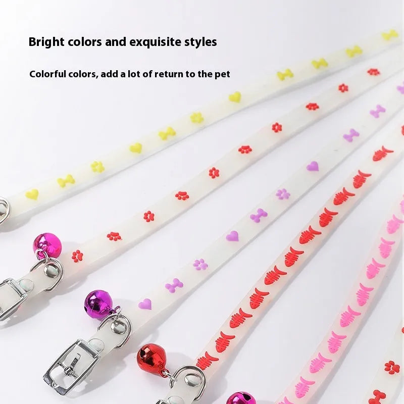 Cat wearing luminous collar with adjustable 29cm silicone chain and metal bell in night setting